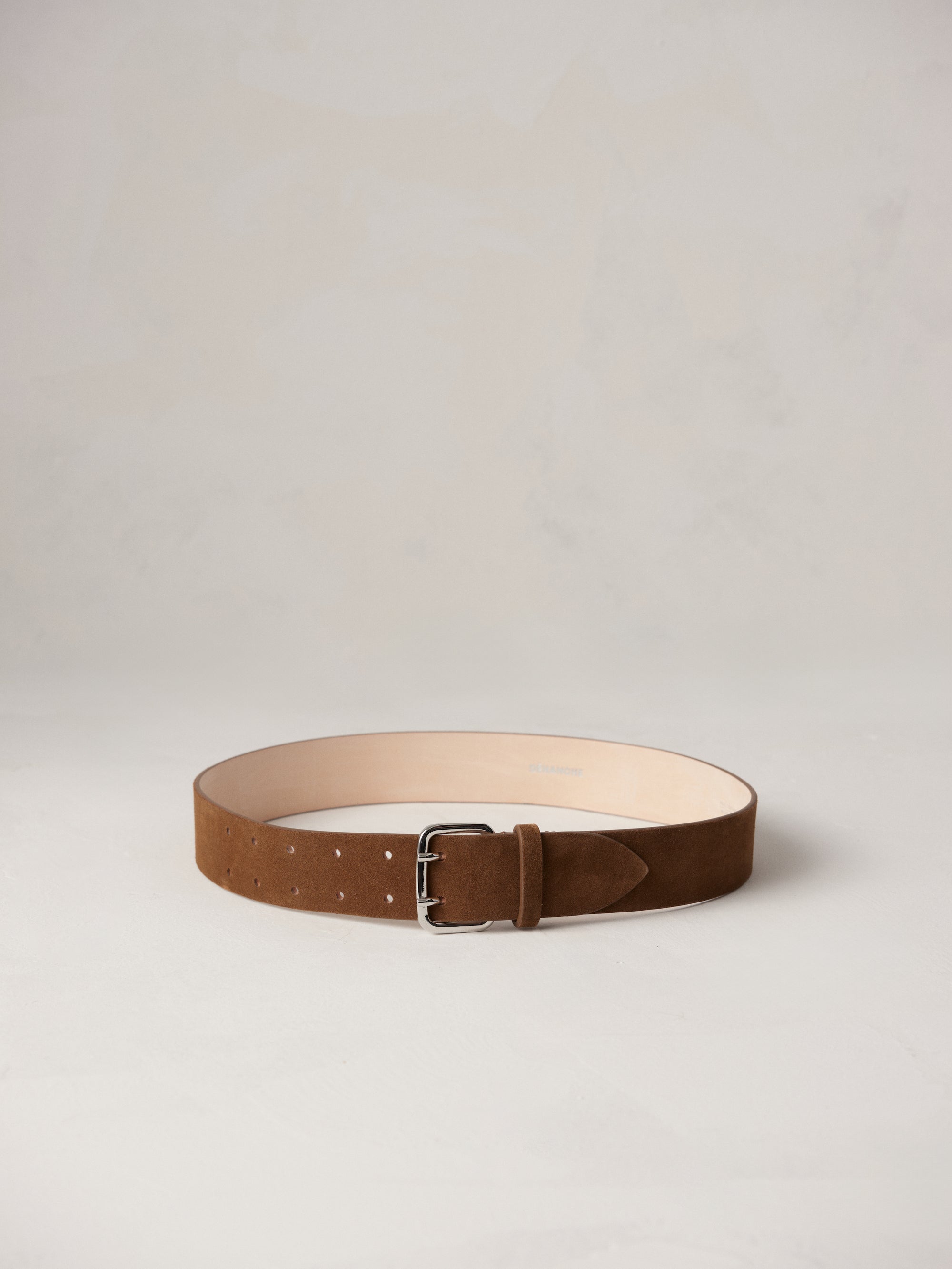 Déhanche Hutch Suede Belt - Elegant brown suede belt with a sleek silver buckle, featuring precise stitching and a minimalist design for timeless style.
