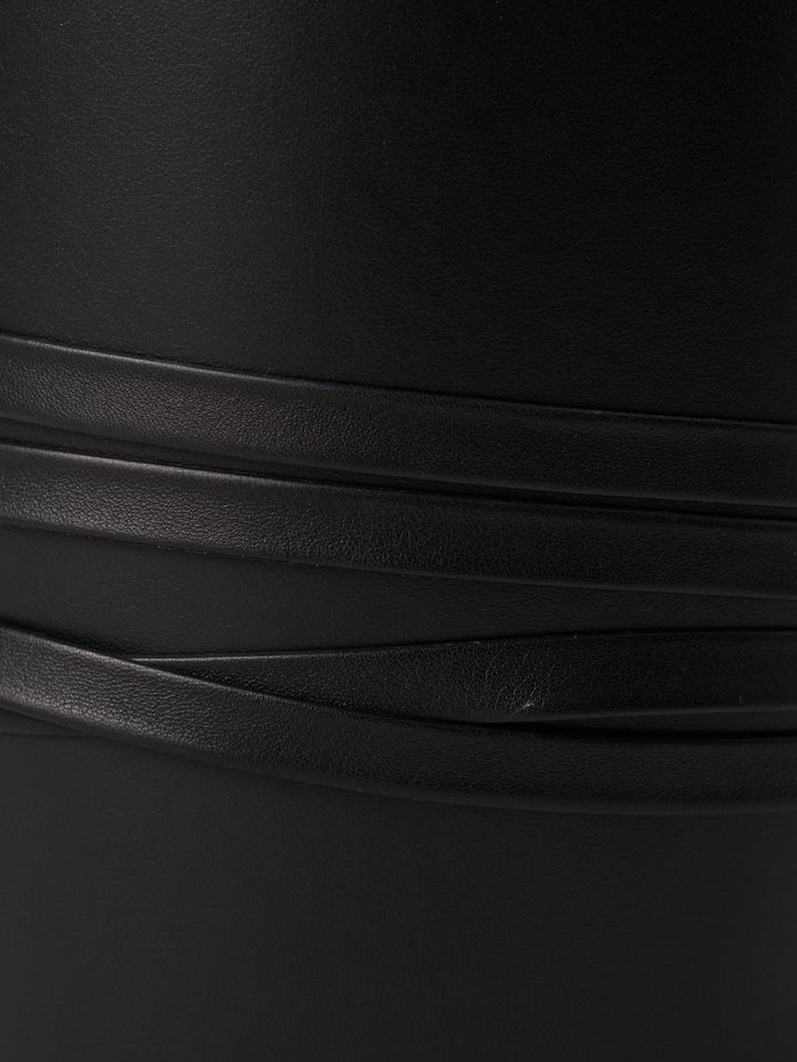 Déhanche Undone Corset in black leather, showcasing a close-up of the corset's exterior in natural leather, highlighting its high-quality craftsmanship.