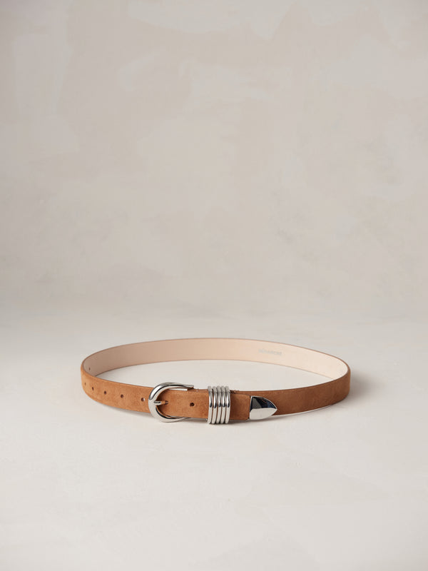 Déhanche Hollyhock Suede Belt - Elegant brown suede leather belt with silver buckle and accents. Perfect for adding a touch of classic sophistication to any outfit.