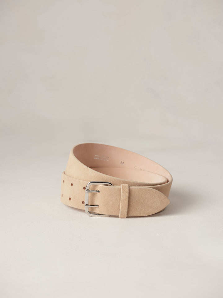 Déhanche Hutch Suede Belt - Natural beige suede belt with a silver buckle, displayed on a minimalist white background, highlighting its elegant design.