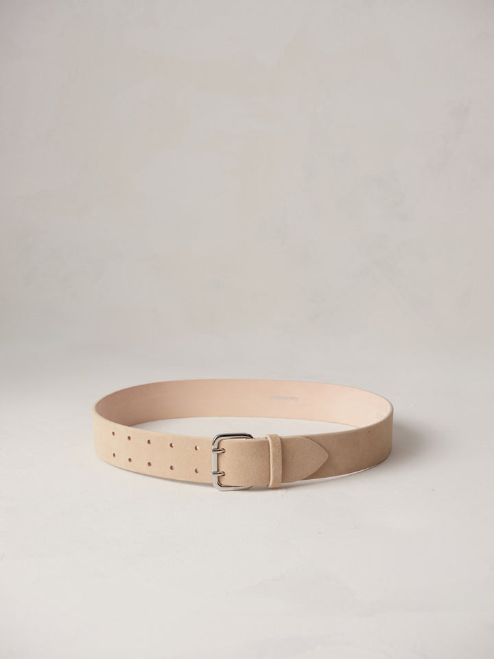 Déhanche Hutch Suede Belt - Natural beige suede belt with a silver buckle, displayed on a minimalist white background, highlighting its elegant design.