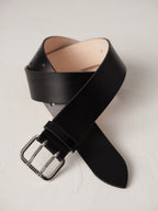 Déhanche Hutch Leather Belt - Classic black leather belt with a sleek silver buckle. Perfect for adding a touch of timeless elegance to any outfit.