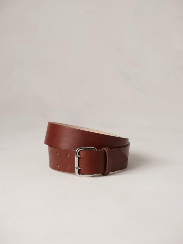 Déhanche Hutch Leather Belt - Classic brown leather belt with a silver buckle. Perfect for adding a touch of timeless elegance to any outfit.